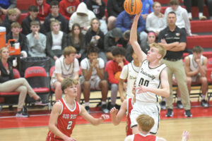 University High boys' hoops team holds off Parkersburg to open season